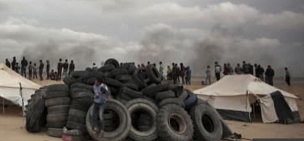 Gazas stockpile tires to burn to provided smokescreen for rioters 